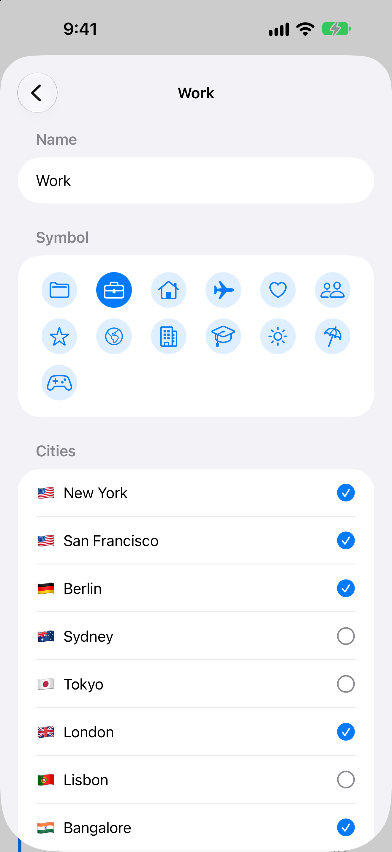 Tempus profile editor for Work: a name field, a grid of symbols with the briefcase selected, and a city list with New York, San Francisco, Berlin, London and Bangalore ticked.